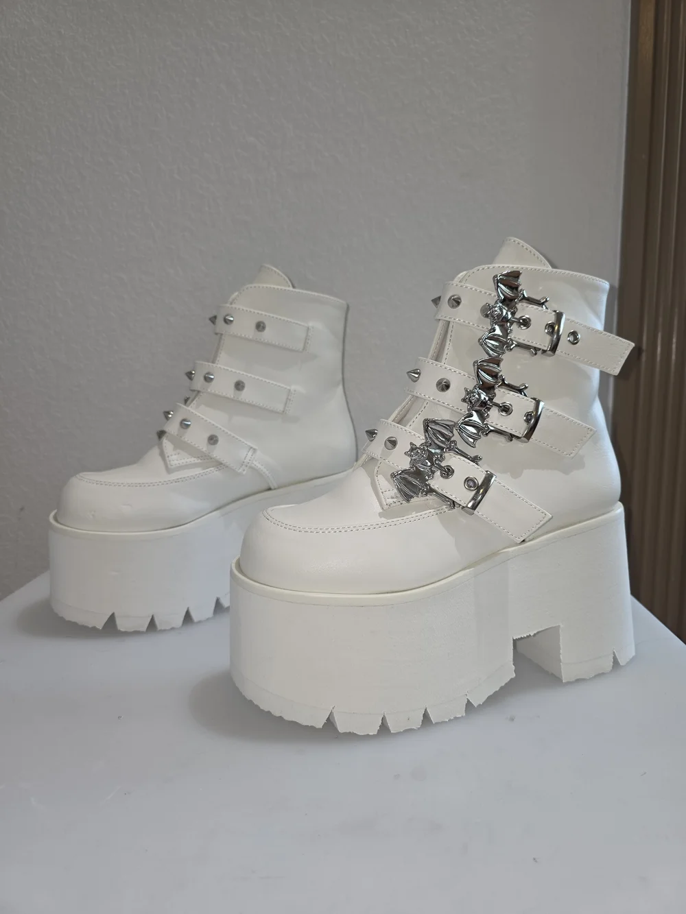 NWT Demonia white platform boots w silver buckles & spikes Sz 6